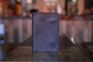 The Pierce Passport Wallet - Black and Tan